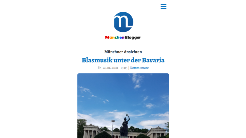 Article titled 'Blasmusik unter der Bavaria' with an image of a statue against a blue sky.