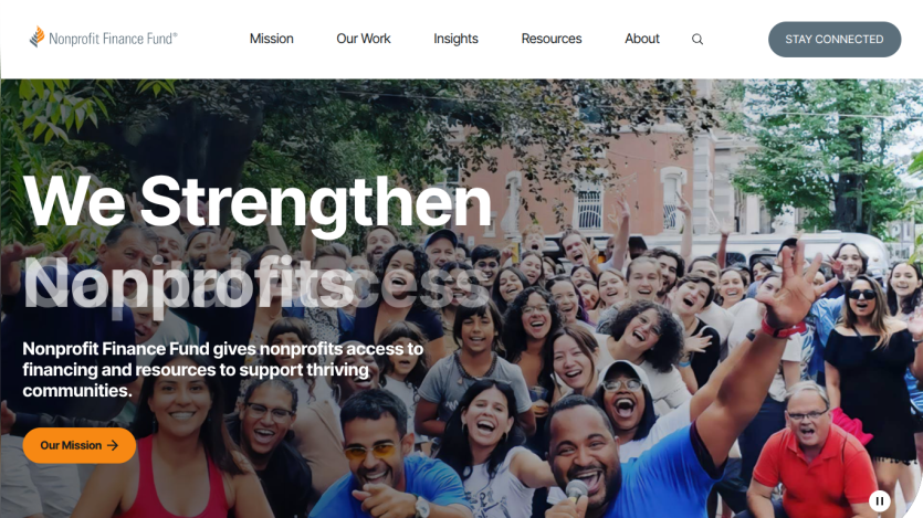Nonprofit Finance Fund homepage with mission statement and workers in orange shirts assembling a structure