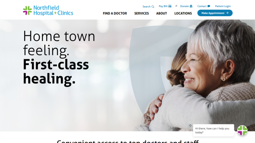 Northfield Hospital + Clinics homepage with slogan 'Home town feeling. First-class healing.' and navigation options