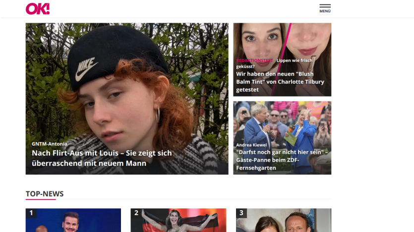 News website featuring articles and images in a grid layout.