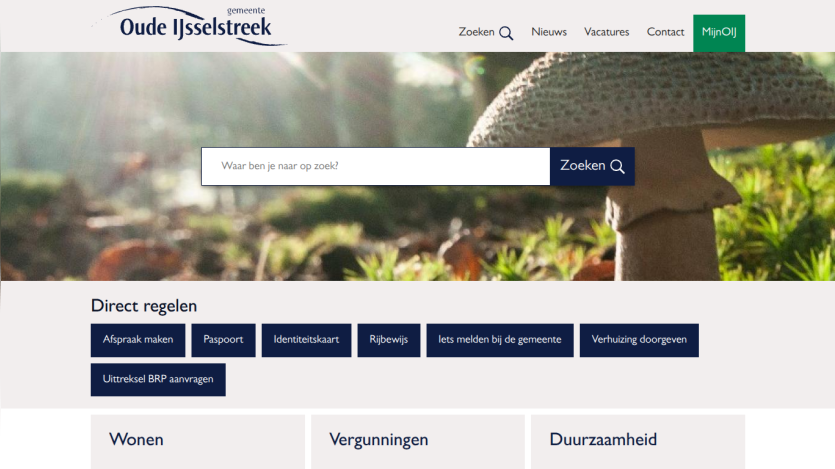 Municipality website homepage with search bar, direct service links like passport and moving notification, and sections on housing, permits, and sustainability.