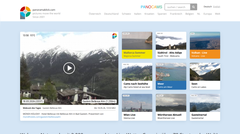 Homepage featuring a video of mountains and various scenic images with descriptions.