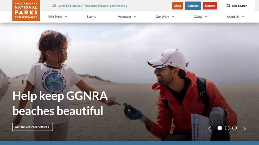 Homepage promoting beach conservation efforts with a child and adult on a beach.
