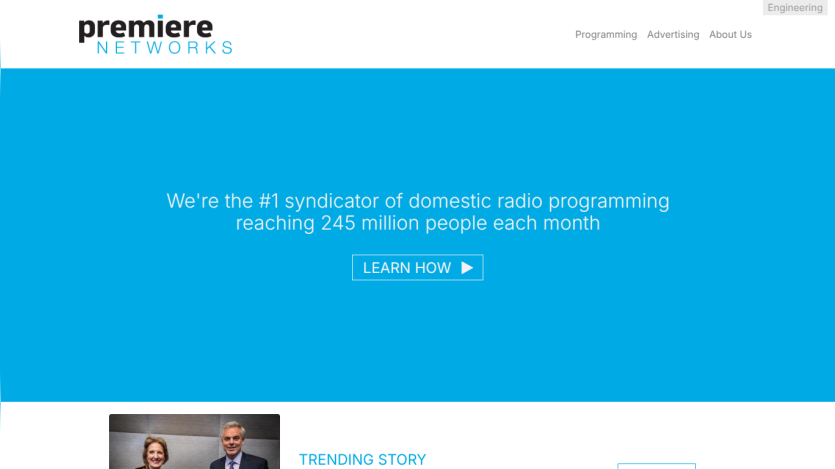 Premiere Networks homepage with headline about domestic radio programming reaching 245 million monthly listeners and a Learn How button