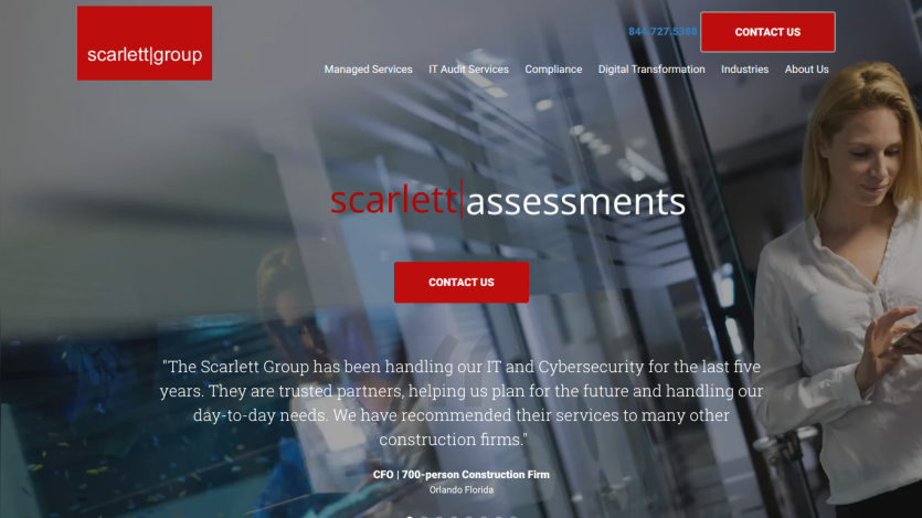 Website hero section with headline 'scarlett assessments', a contact button, and a woman working on a laptop.