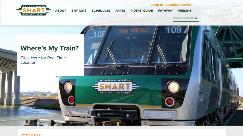 Sonoma-Marin Area Rail Transit website with navigation menu and a train front labeled San Rafael, featuring a real-time train location link