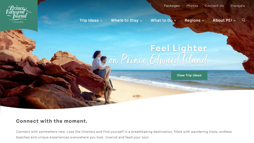 Promotional section for Prince Edward Island with a couple on the beach and a call to action to view trips.