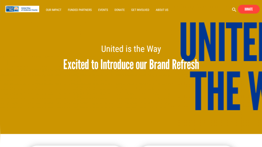 Homepage header with navigation menu and hero section featuring a scenic mountain landscape and welcome text