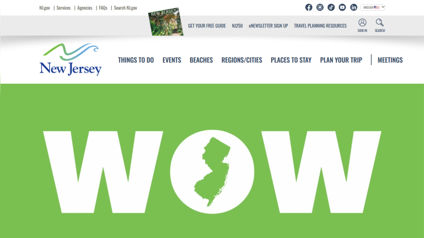 New Jersey tourism website featuring a bold 'WOW' headline and state outline on a green background.