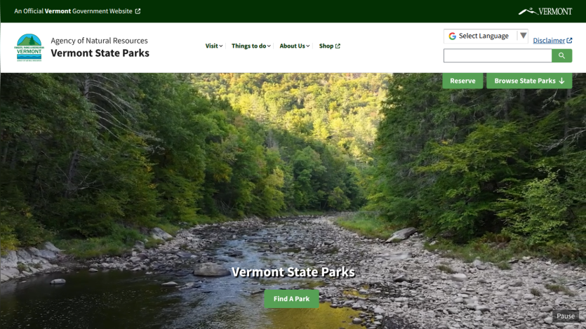 Vermont State Parks homepage with navigation and a river landscape hero image promoting park exploration