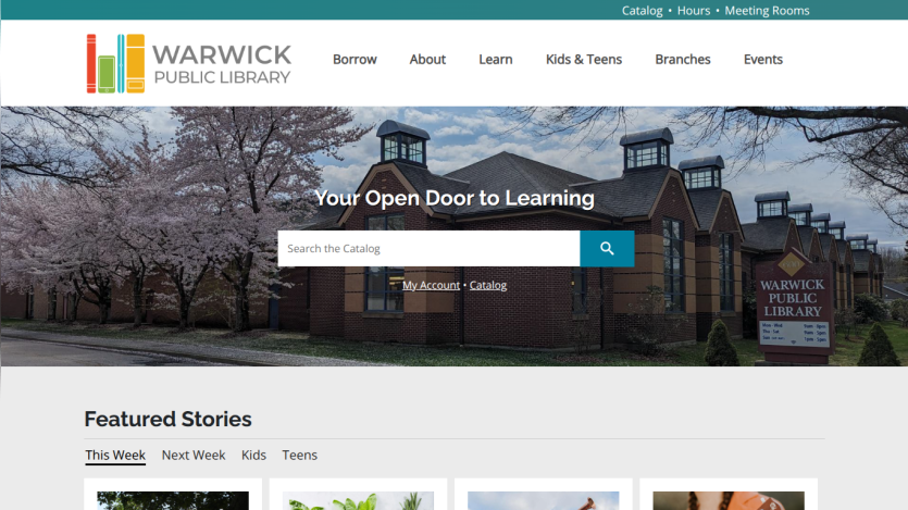 Warwick Public Library homepage featuring search bar and highlighted stories.