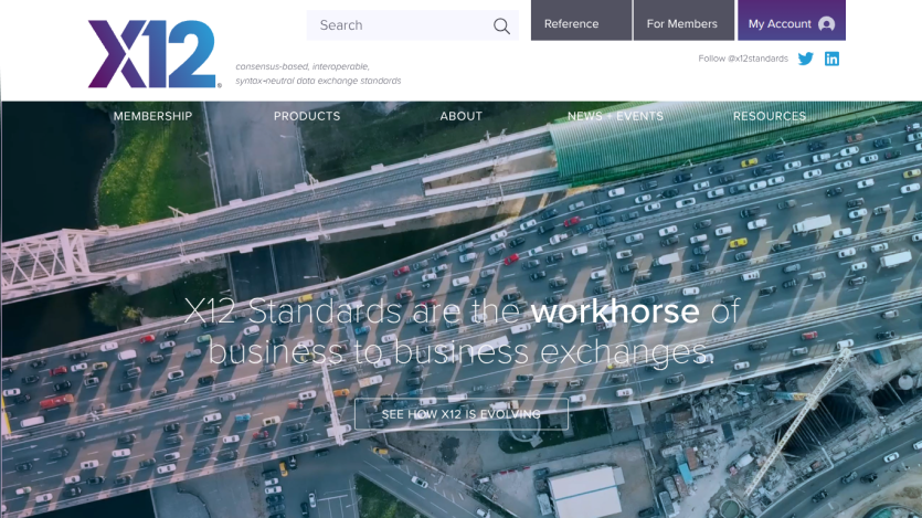 X12 website with navigation, search, and hero text about business-to-business exchange standards over a traffic aerial image