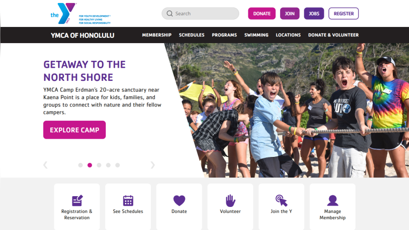 YMCA of Honolulu homepage with navigation, camp promotion, and options for registration, schedules, donation, volunteering, and membership