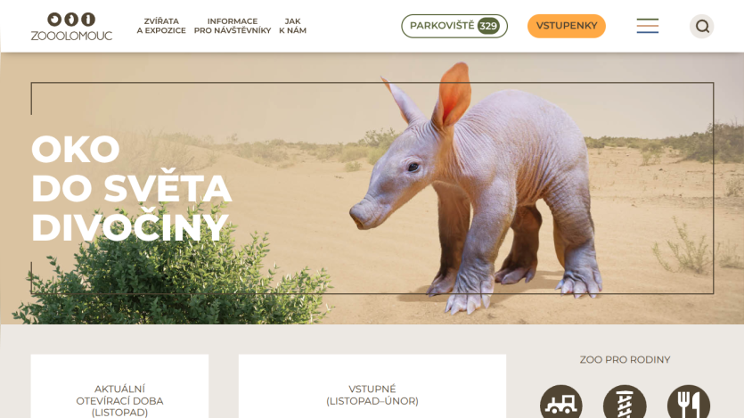Zoo Olomouc website with navigation, parking info, tickets button, and hero image of a baby aardvark in a desert