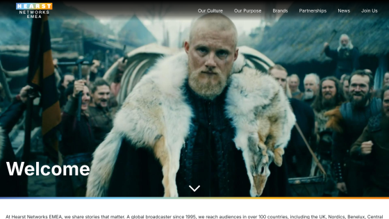 Homepage featuring a welcome message and a prominent hero image of a man in a fur coat.