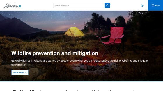 Wildfire prevention and mitigation information with a scenic background and call-to-action button.