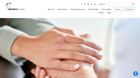 Autism Ontario website header with navigation links and a hero image of hands gently holding each other