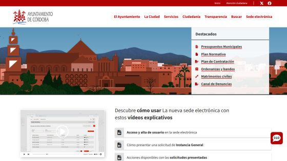 Ayuntamiento de Córdoba website with navigation menu, cityscape illustration, and links to municipal budgets and services videos
