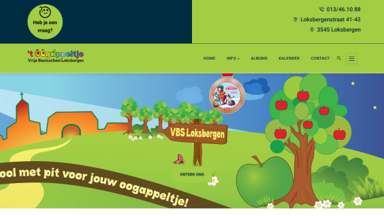 Homepage of VBS Loksbergen school with contact info, navigation menu, and colorful illustrated hero with apple tree and school sign
