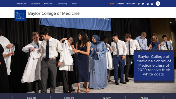 Baylor College of Medicine students receiving their white coats during a ceremony.