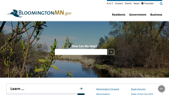 Bloomington MN government website with navigation links and a search bar over a nature scene