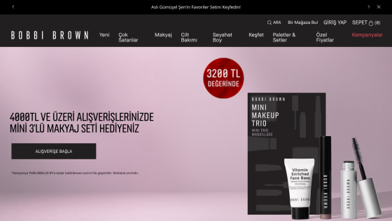 Bobbi Brown website featuring a promotional offer for a mini makeup set with pricing details.