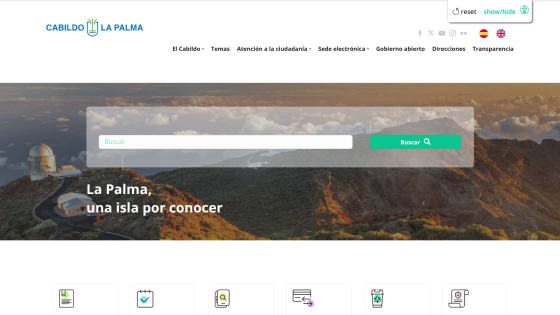 Government site for La Palma island with navigation menu and search bar over a scenic mountain background