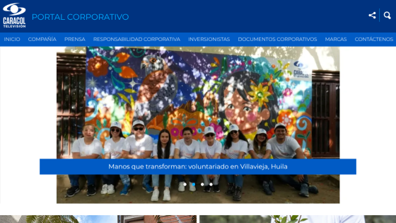 Corporate portal homepage featuring a colorful mural and a group of volunteers in front.