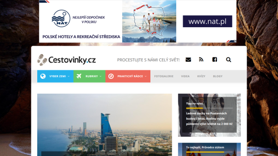 Travel website Cestovinky.cz with navigation and a city skyline hero image, featuring travel tips and guides