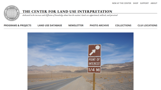The Center for Land Use Interpretation homepage with navigation links and a desert road scene featuring an interpretative site sign.