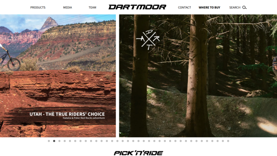 Dartmoor website header with navigation and hero image of a biker performing a jump in Koprivna Bikepark