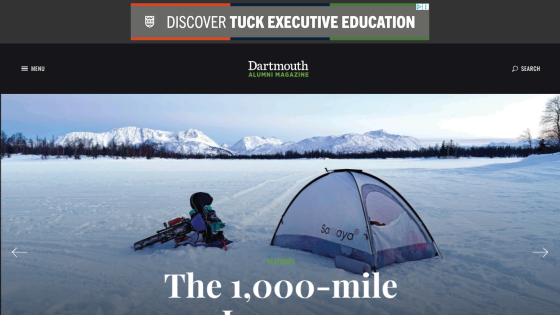 Dartmouth Alumni Magazine homepage with snowy mountain landscape and camping tent in hero section