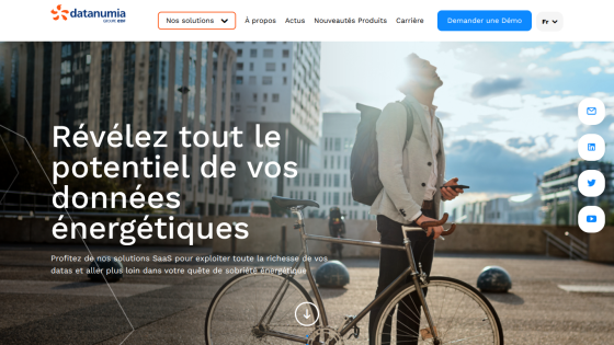 Datanumia homepage with a man holding a bicycle and text about unlocking energy data potential and SaaS solutions.