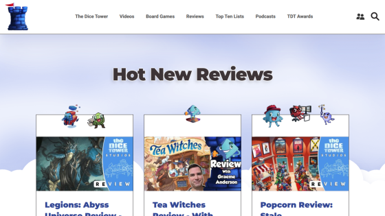 The Dice Tower website showing hot new reviews for board games including Legions: Abyss, Tea Witches, and Popcorn Review.