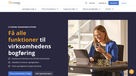 Website offering accounting solutions with a woman using a laptop and key features highlighted.