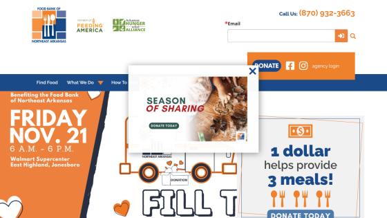 Homepage with navigation bar, large hero image featuring a person using a laptop, and headline promoting productivity software