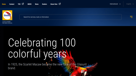 Glasurit website celebrating 100 colorful years with Scarlet Macaw as brand face since 1925