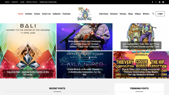 Homepage featuring Bali travel journey, music event, and cultural articles with navigation menu and recent posts section
