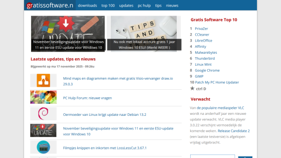 Homepage of a Dutch software site showing latest updates, top 10 software list, and news about Windows and Linux updates
