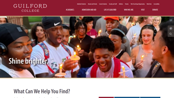 Guilford College homepage with navigation and hero image of students holding candles and headline 'Shine brighter.'