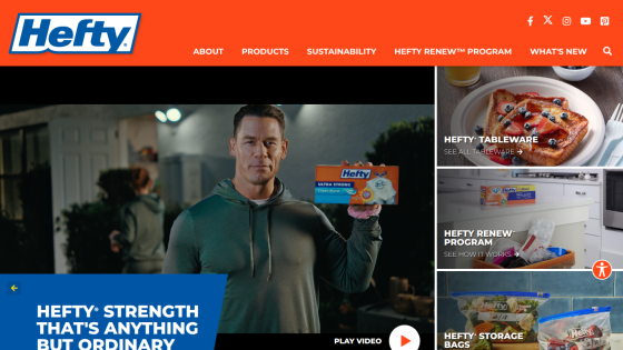 Hefty website header with navigation and hero section featuring a man holding Hefty Ultra Strong Clean Burst product and links to tableware, renew program, and storage bags.