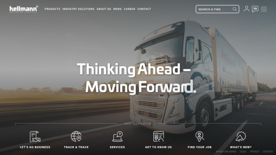 Logistics company homepage with a truck on a highway and the slogan 'Thinking Ahead – Moving Forward'