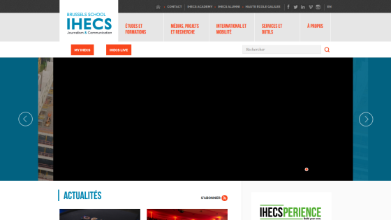 Homepage of IHECS featuring a building image and a call-to-action button.
