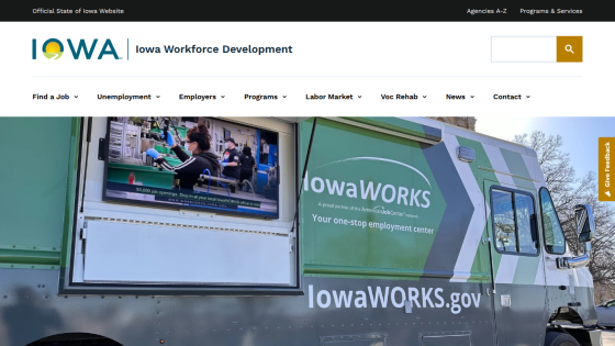 Iowa Workforce Development website with navigation menu and hero image of IowaWORKS mobile employment center