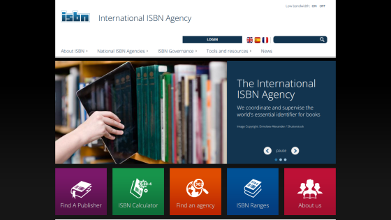 International ISBN Agency homepage with navigation, hero image of hand holding tablet near books, and key text about coordinating book identifiers