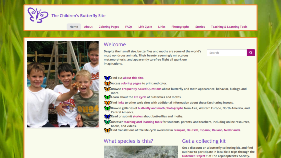 Homepage of The Children's Butterfly Site featuring a boy observing a butterfly in a container.