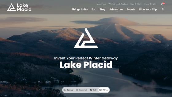 Lake Placid winter getaway promotion with mountain and lake background and seasonal navigation