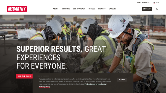 Construction workers in helmets with text promoting superior results and experiences.