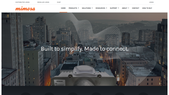 Homepage of Mimosa with a cityscape background and the tagline 'Built to simplify. Made to connect.'