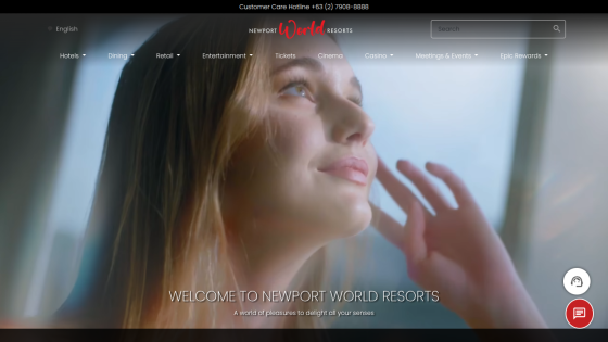 Newport World Resorts homepage with a welcoming message and a woman looking upwards in the hero section